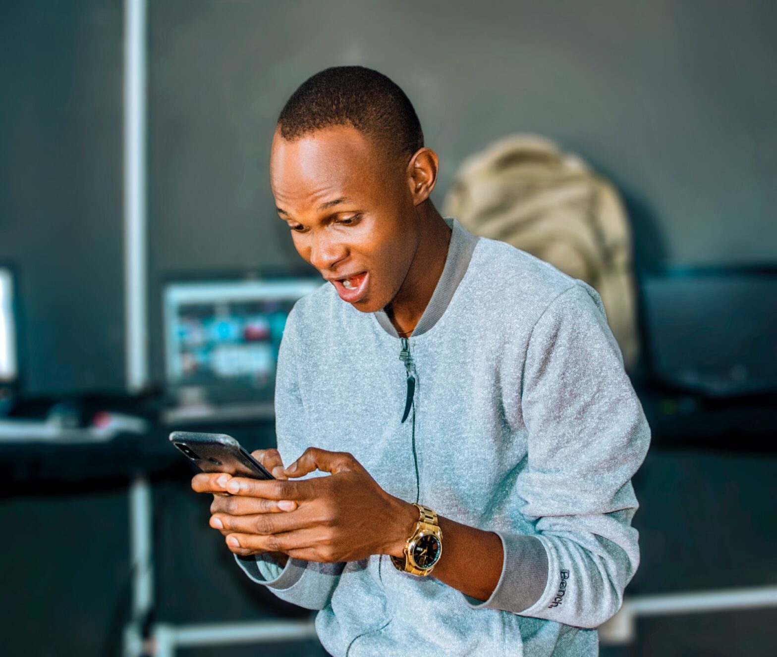 A man watching a video on his phone