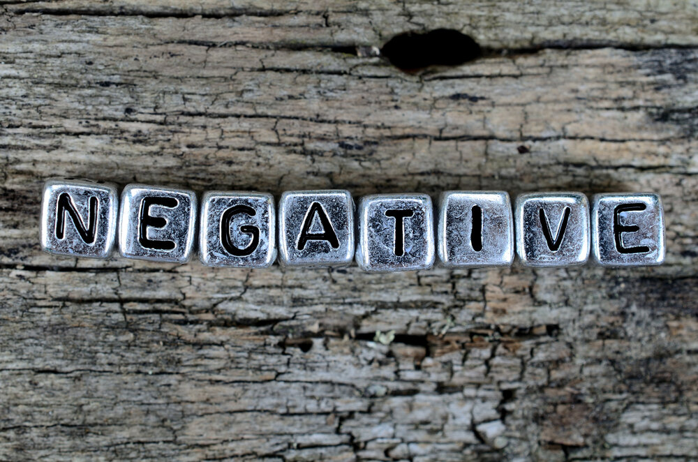 The keyword negative written on silver cubes